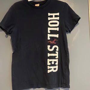 Women’s size small Hollister T-shirt color is navy blue in like new condition.